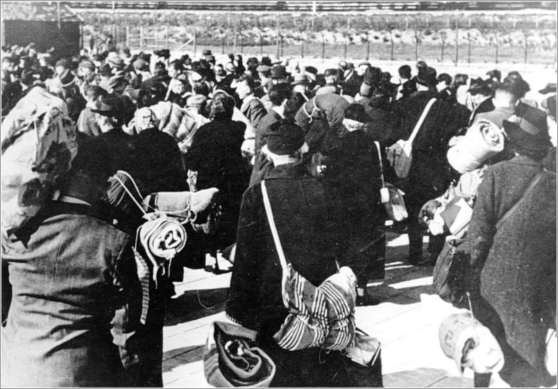 Jews in Amsterdam at an assembly point prior to their deportation.